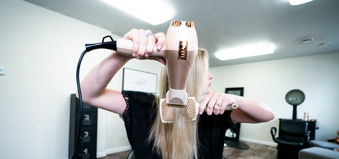 Samantha blowdrying hair with TYME paddle brush BlowTYME hair dryer