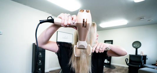 Samantha blowdrying hair with TYME paddle brush BlowTYME hair dryer
