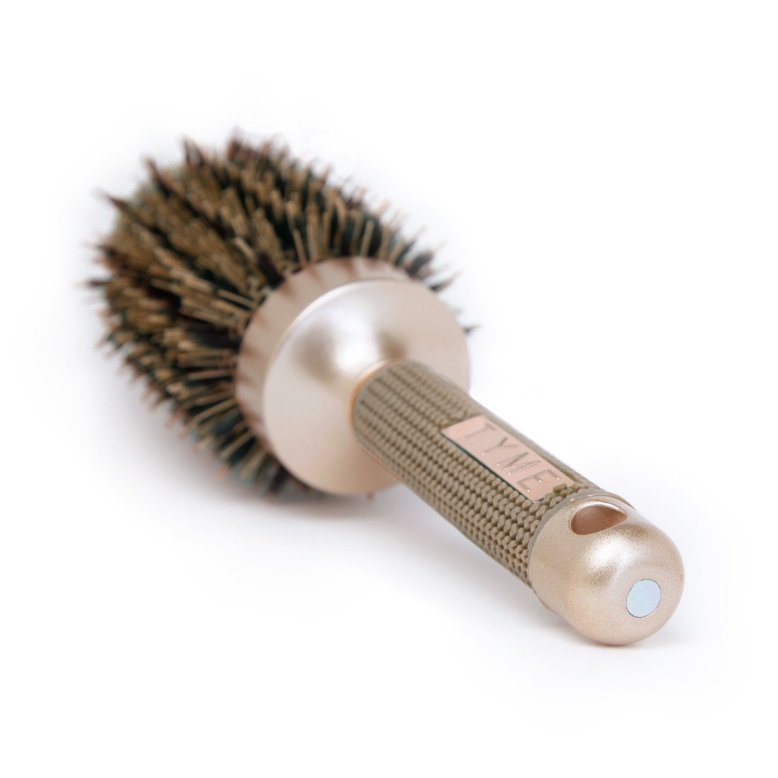 End of handle on TYME 3-inch Round Hair Brush showing hole for hook storage and magnet for alternative storage.