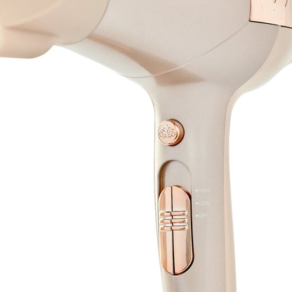 TYME BlowTYME Hair Dryer rose gold heat settings switch, power adjustment switch and cool shot button.