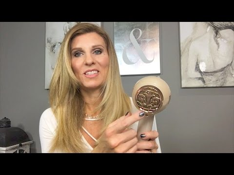 Jacynda Smith displaying the BlowTYME hair dryer
