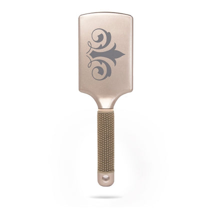 Back of TYME Paddle Hair Brush back view with fleur de lis logo on rectangle shaped brush head.
