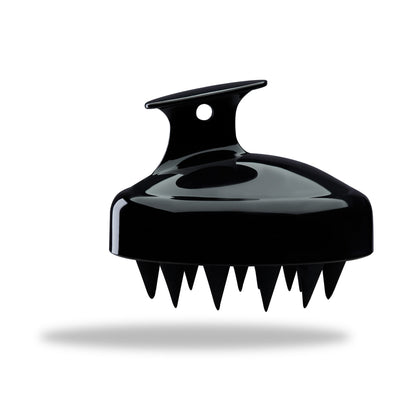 Shampoo brush for hair with comfort grip.