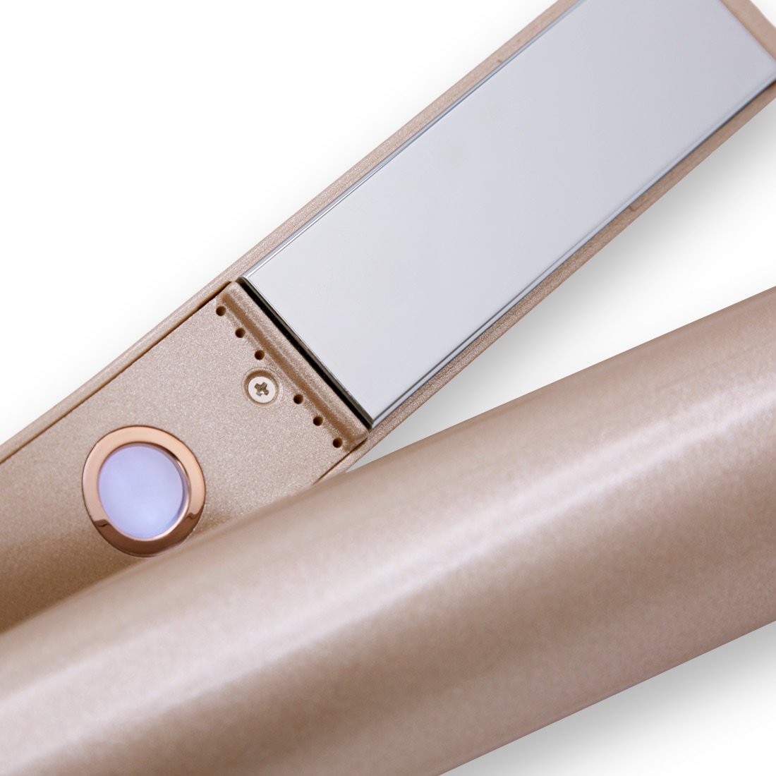 Close-up of the titanium plates inside the barrel of the TYME Iron Pro, with the lavender white power button unlit and off.
