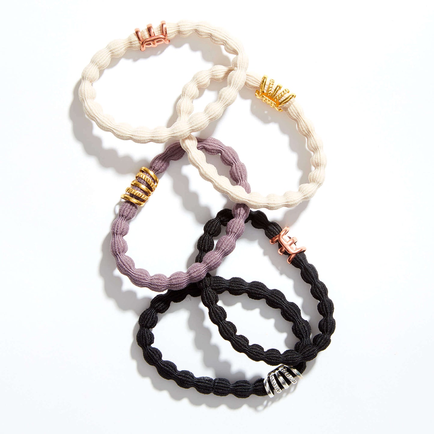 five damage tug free ponytail holder and bracelet with rose gold and gold accent beads 